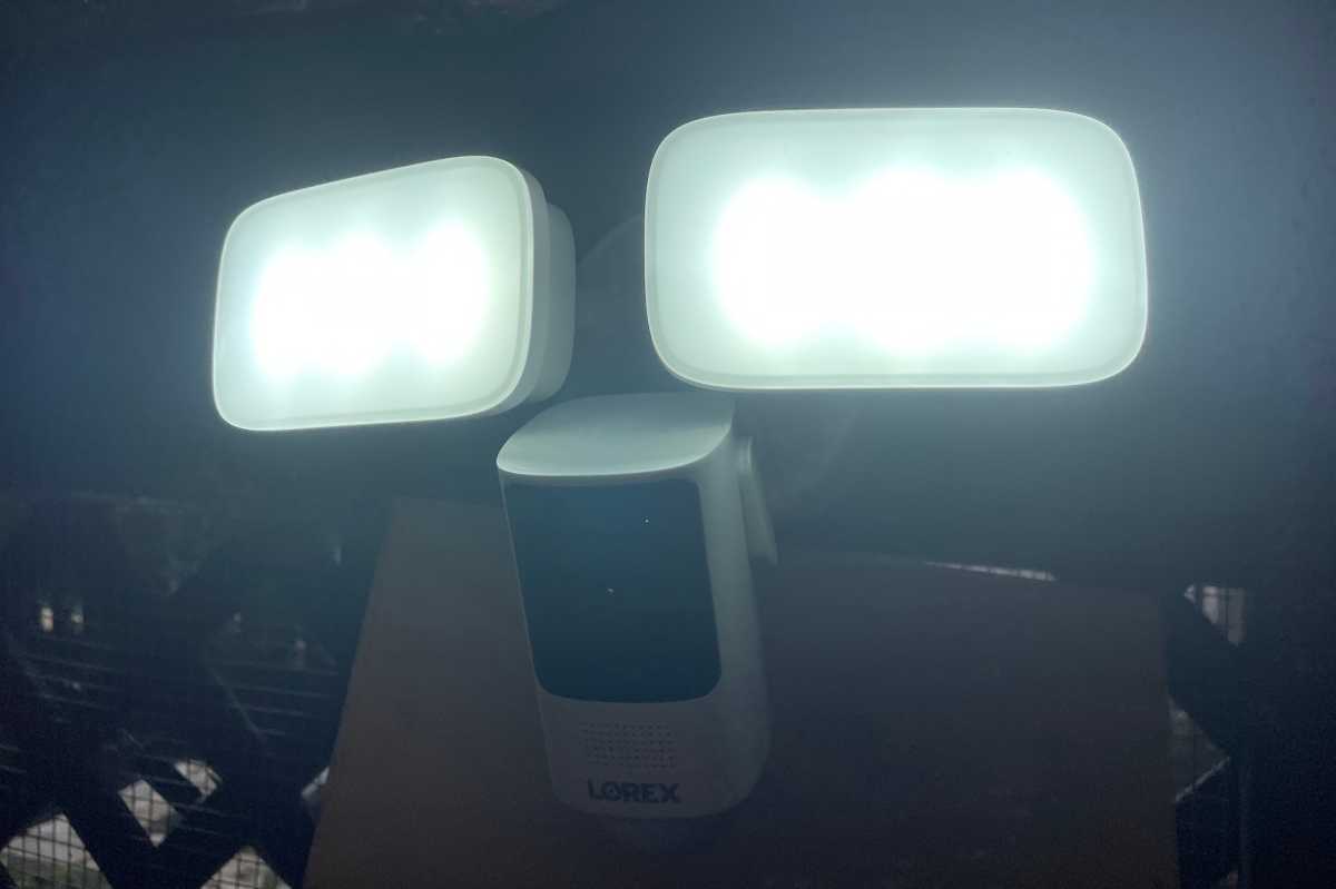 Lorex 2K Wi-Fi Floodlight Security Camera LED panels lit
