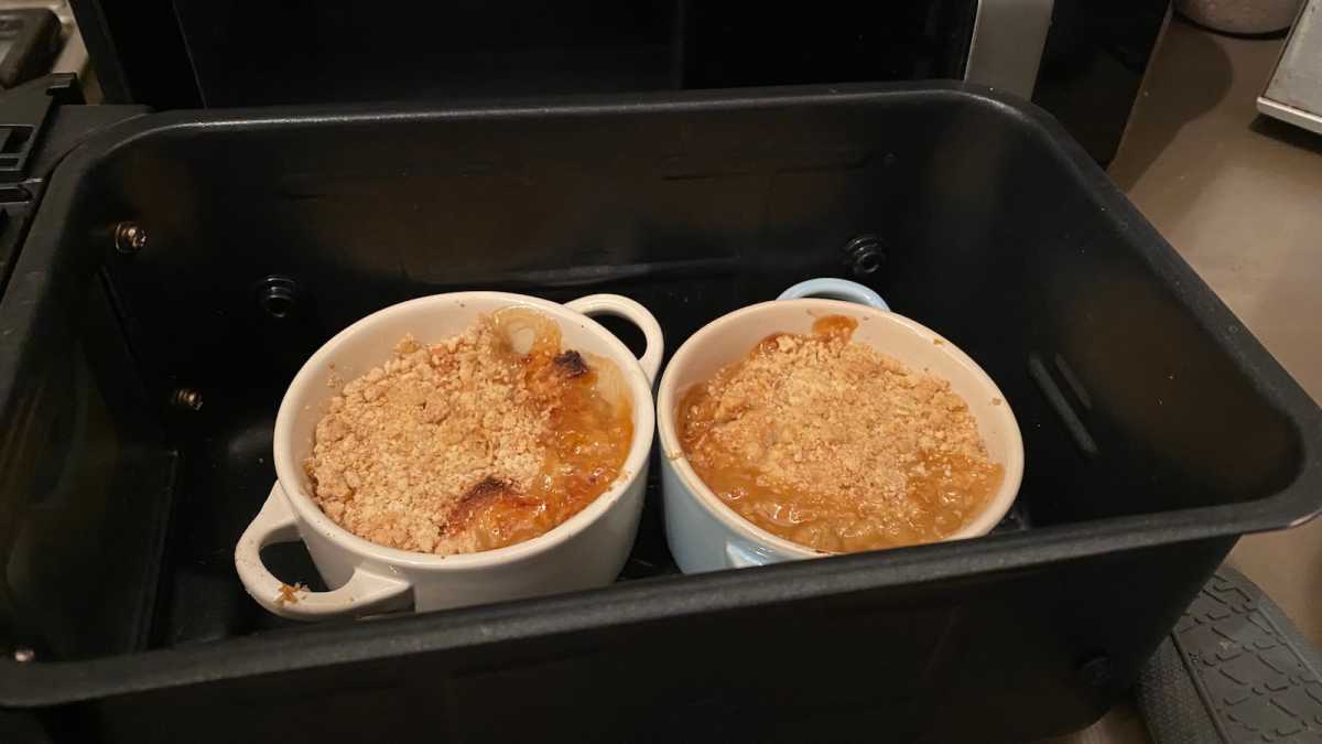 Apple crumble in pots in an air fryer drawer