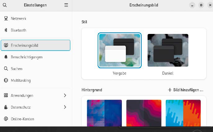 Wenig Auswahl: Ein Standard-Gnome bietet nur wenige Einstellungen für die Optik. Es lassen sich zwei Desktop- Stile und Hintergrundbilder konfigurieren.