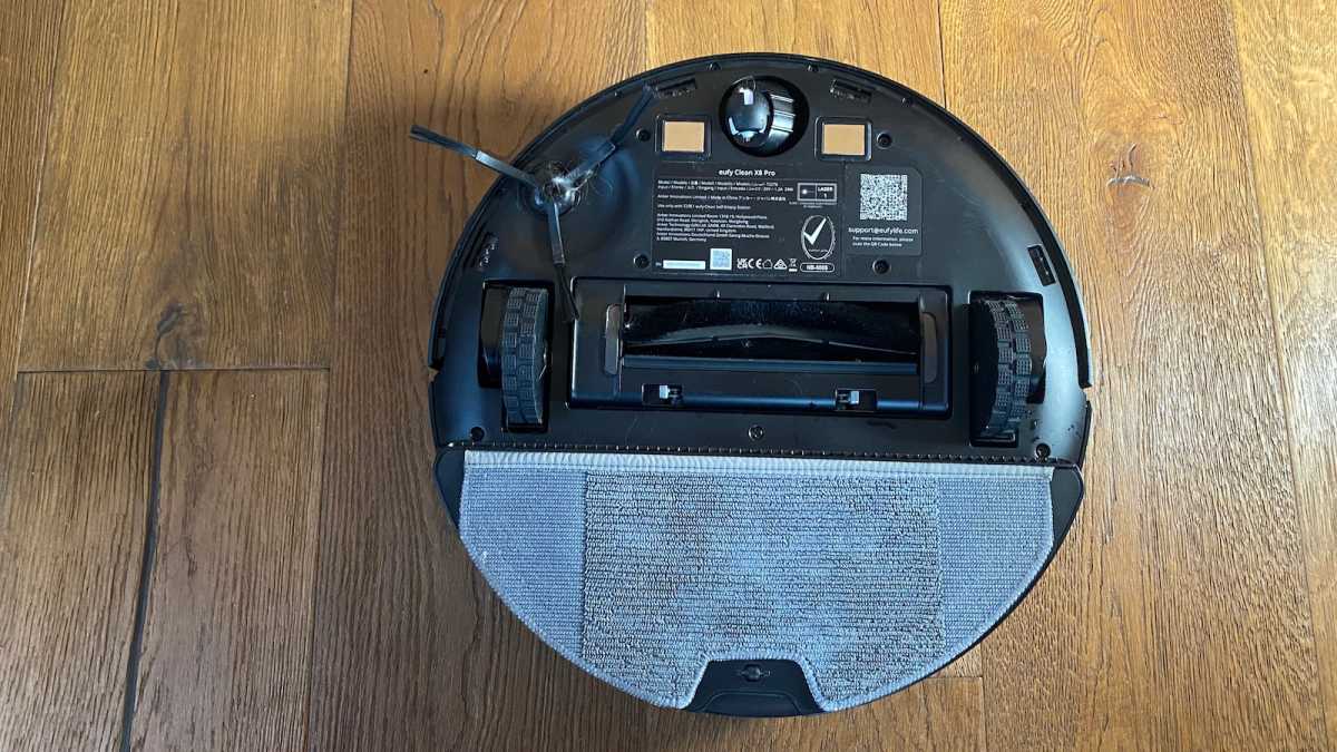 Underside of the robot vacuum, showing its mop