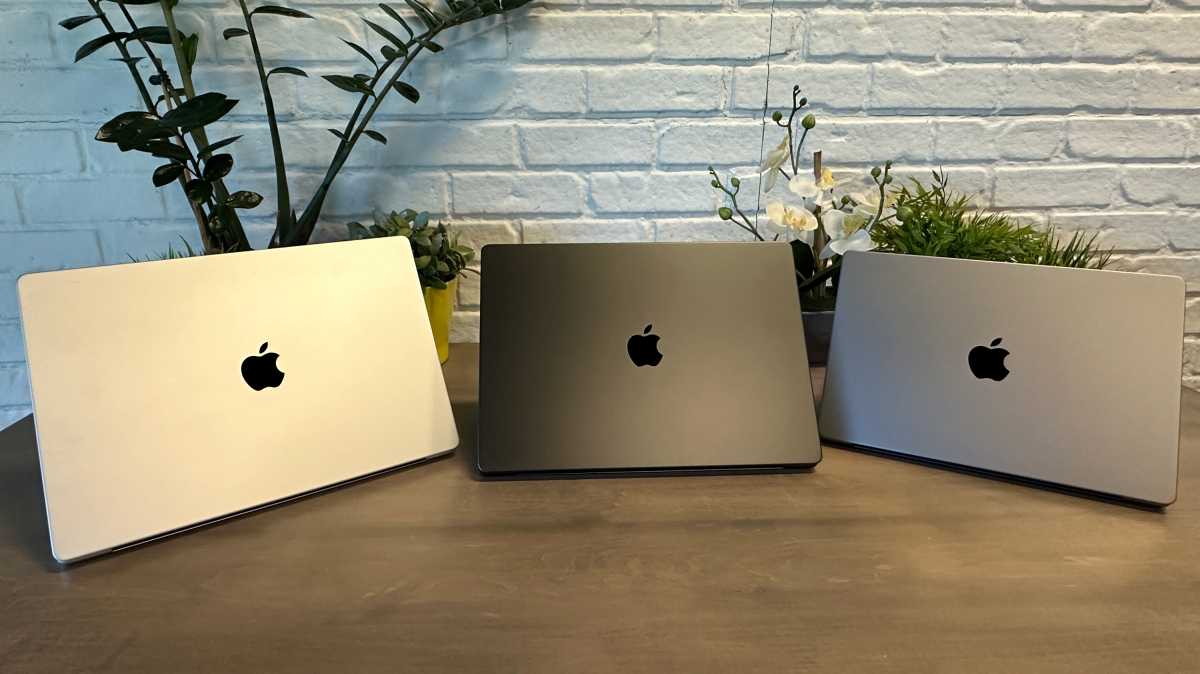 The 2023 MacBook Pro in Silver (middle), Space Black (center), and Space Gray (right)
