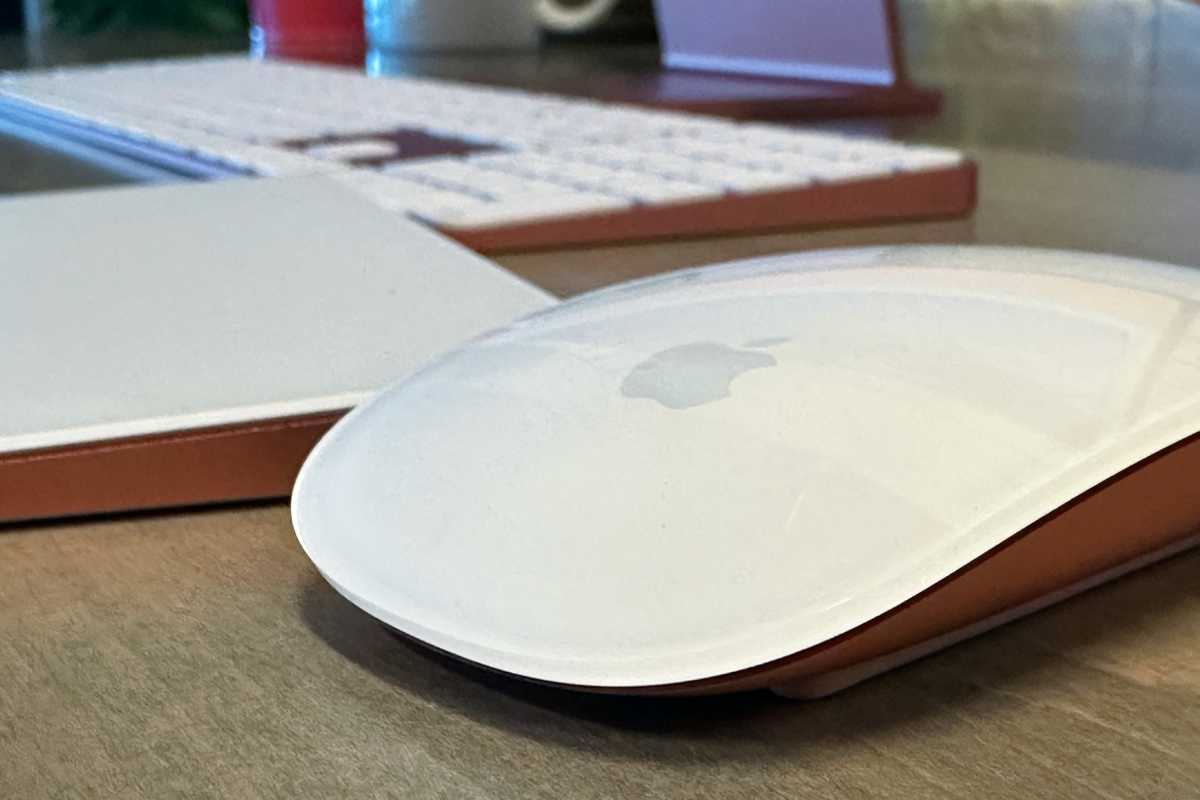 Orange magic mouse, magic trackpad, magic keyboard