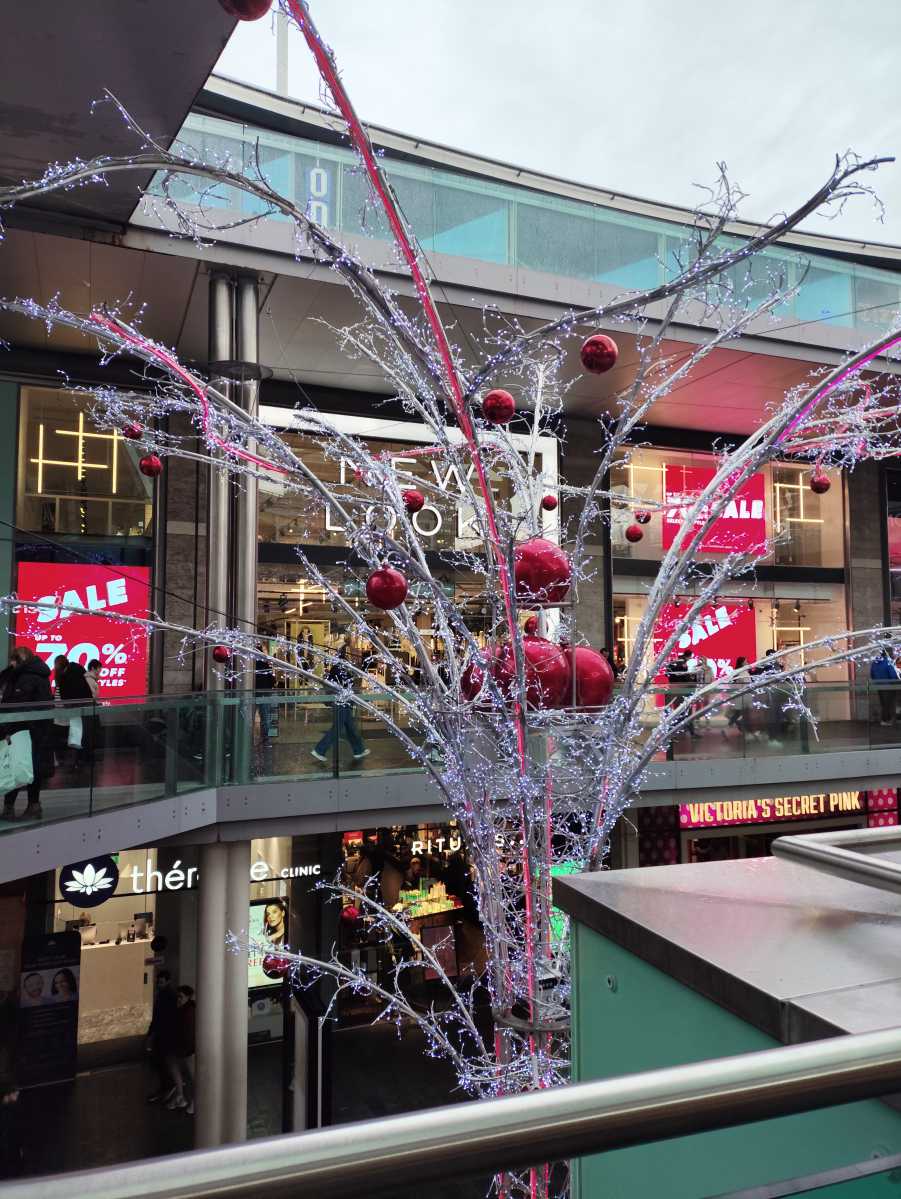 Lit-up Christmas tree in shopping centre