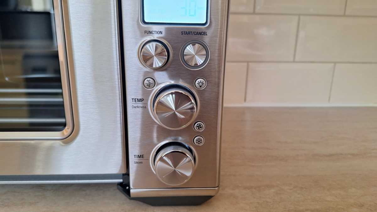 A close up of the Sage Smart Oven Air Fryer control dials and buttons