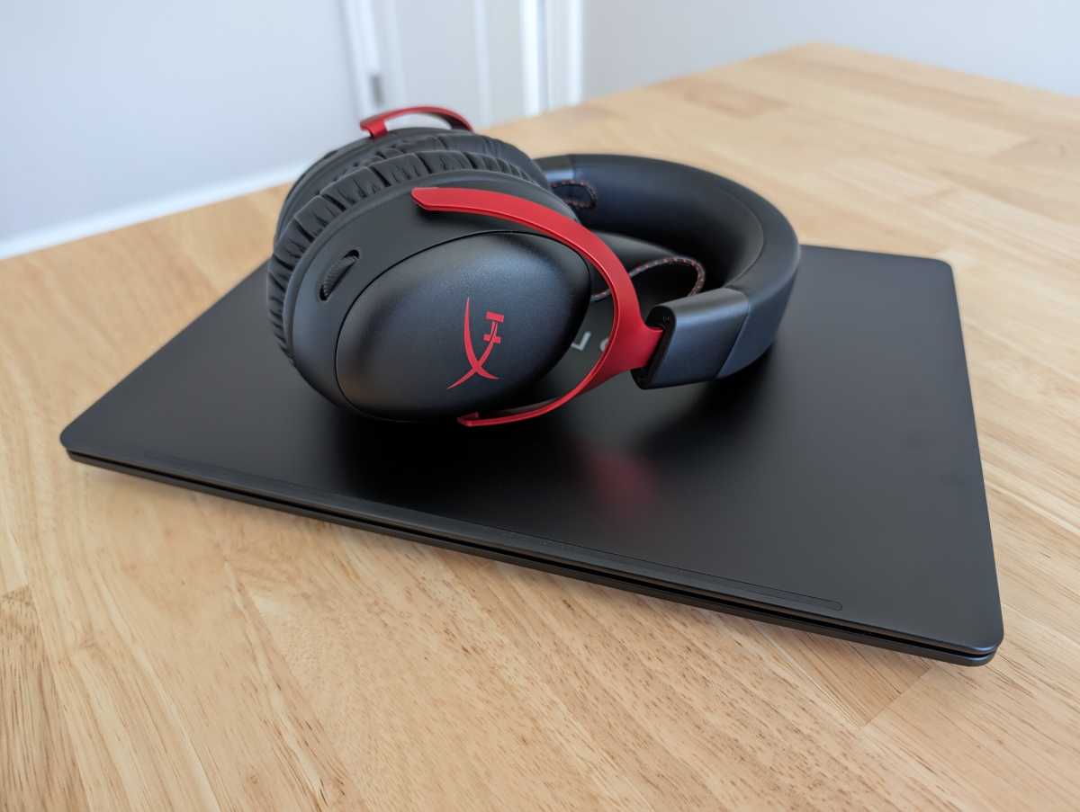 HP Omen Transcend laptop and headphones