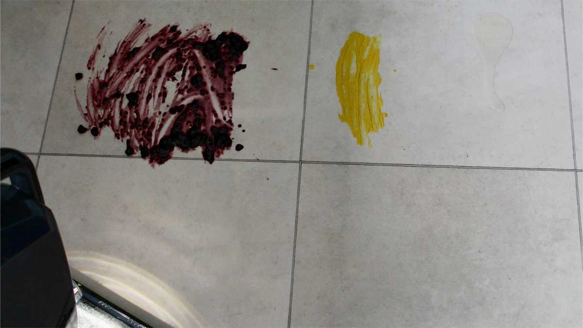 Jam, mustard and oil on a tiled floor