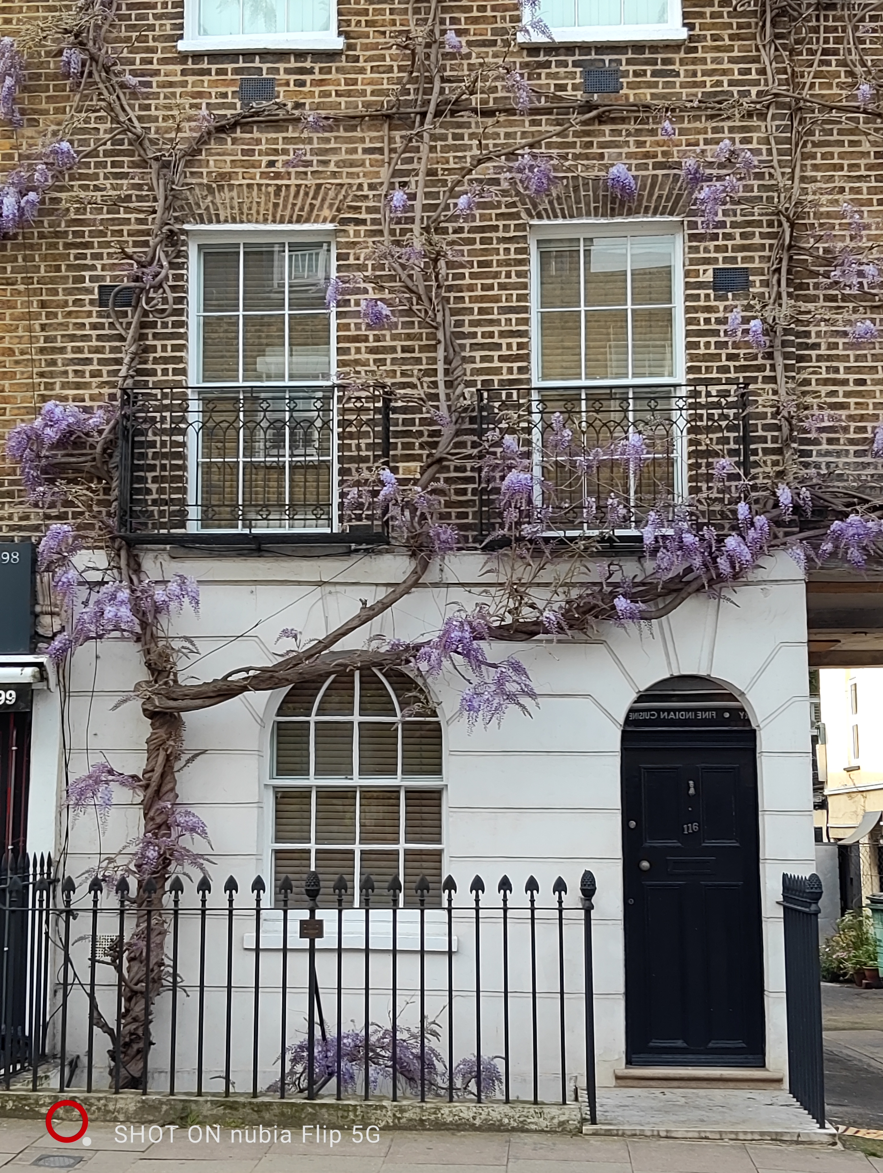 Building with flowers on the outside