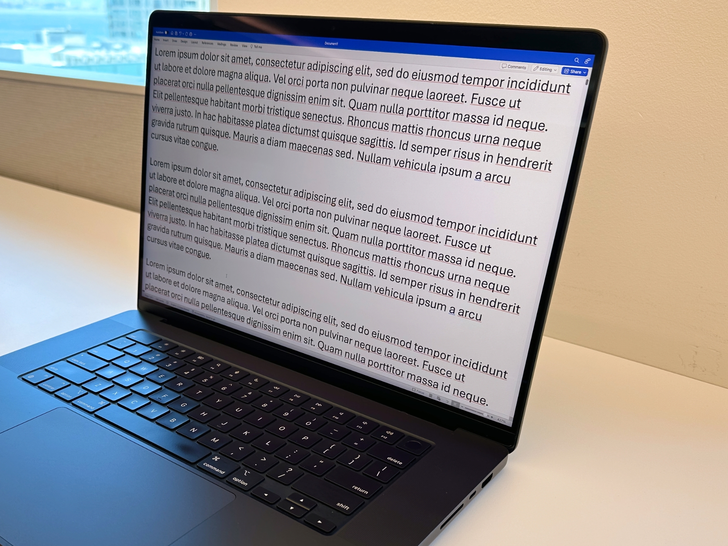 Text displayed at right angles on MacBook Pro