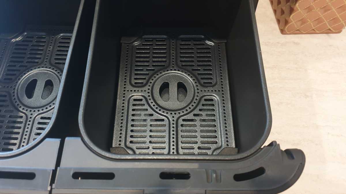 A view of the inside of a Sharp Dual Drawer 8l Digital Air Fryer drawer