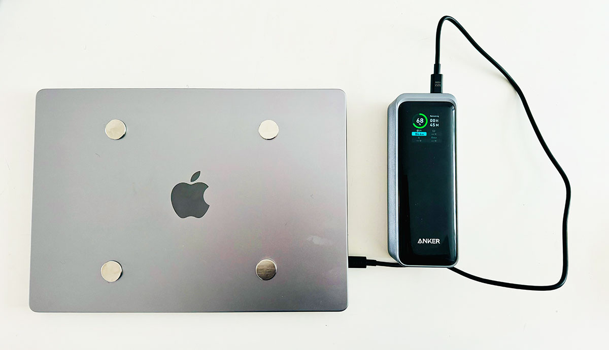 Anker Prime 27650mAh Power Bank charging a MacBook Pro