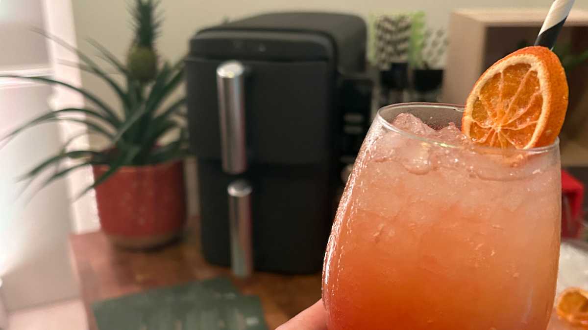 Aperol spritz cocktail with dehydrated orange