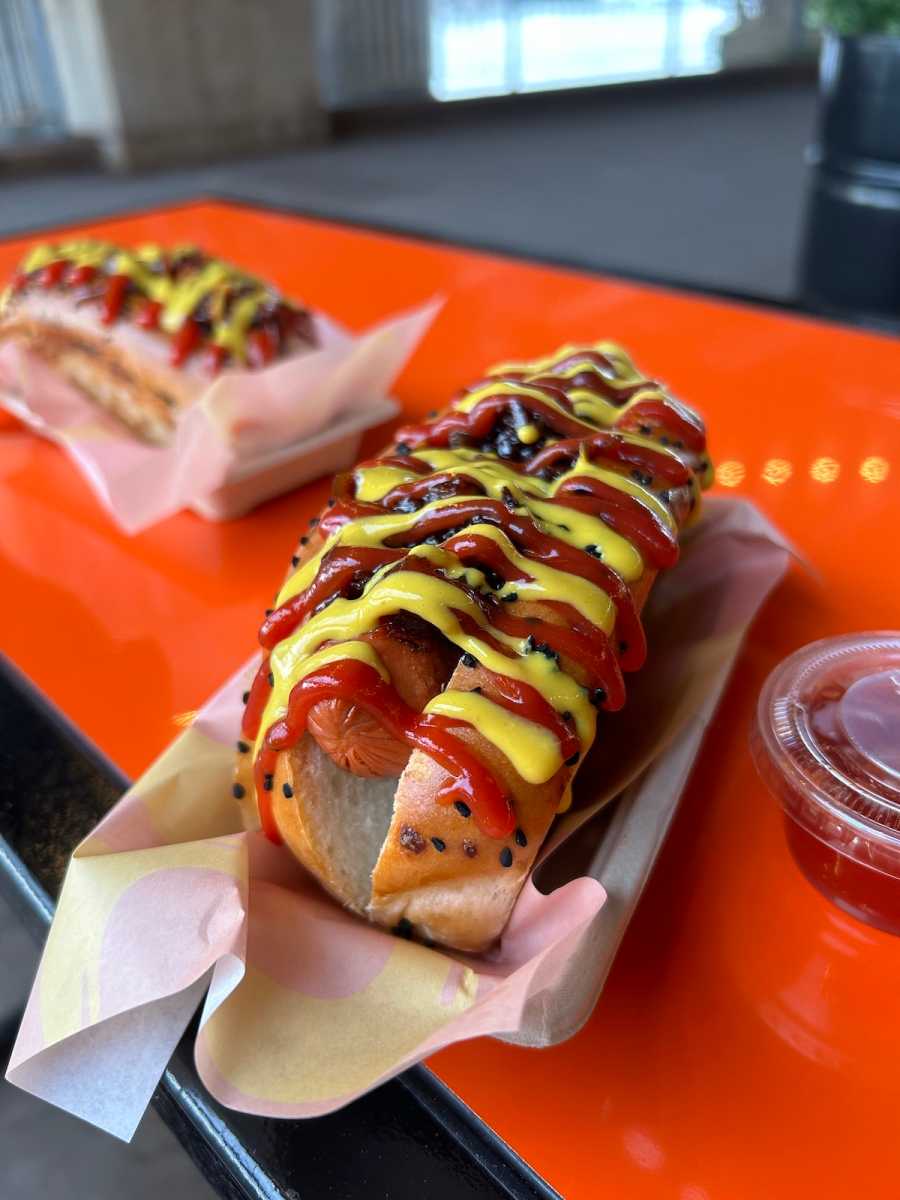 Hot dogs on an outdoor table