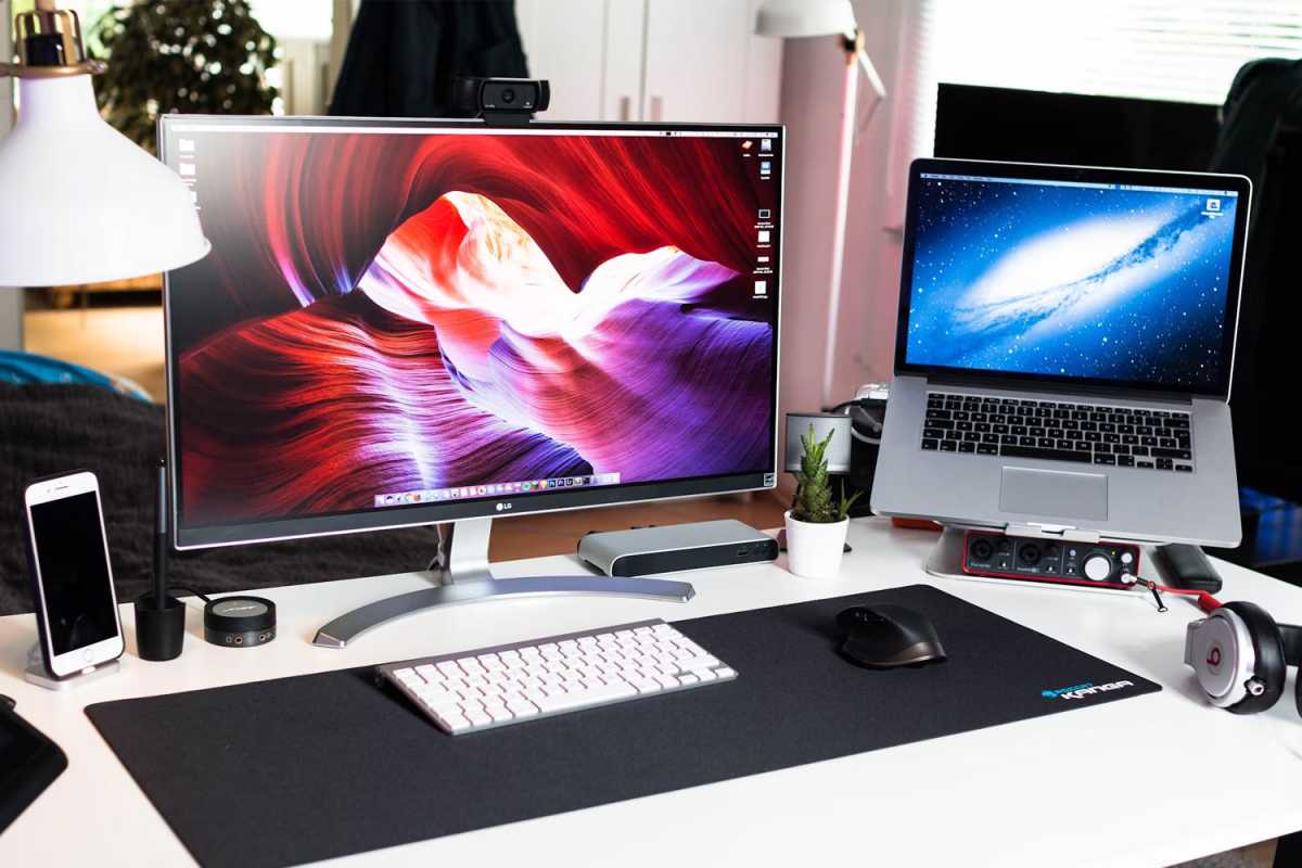 Home workstation setup with laptop monitor and docking station