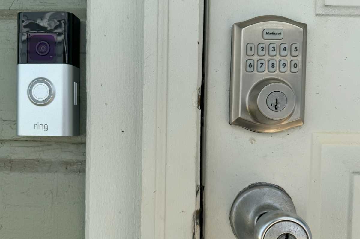 Ring Battery Doorbell Plus installed next to Kwikset smart lock
