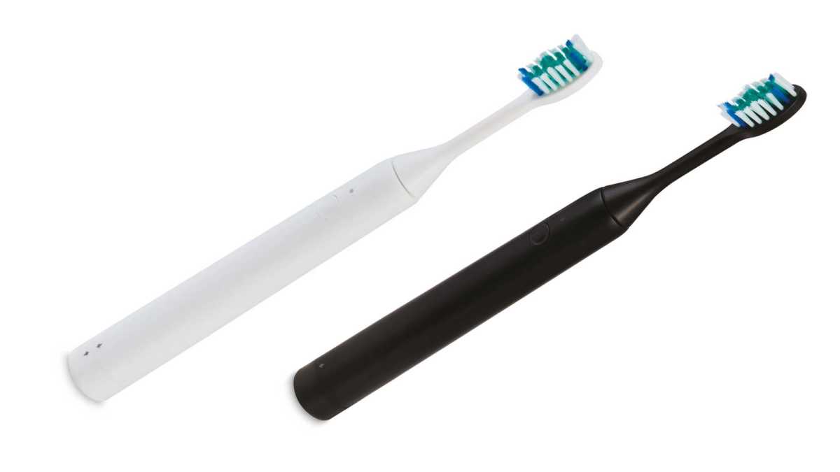 Two Aldi Ambiano electric toothbrushes