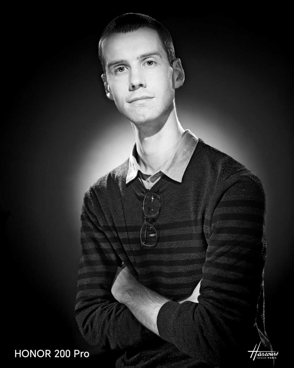 A man in a Studio Harcourt portrait