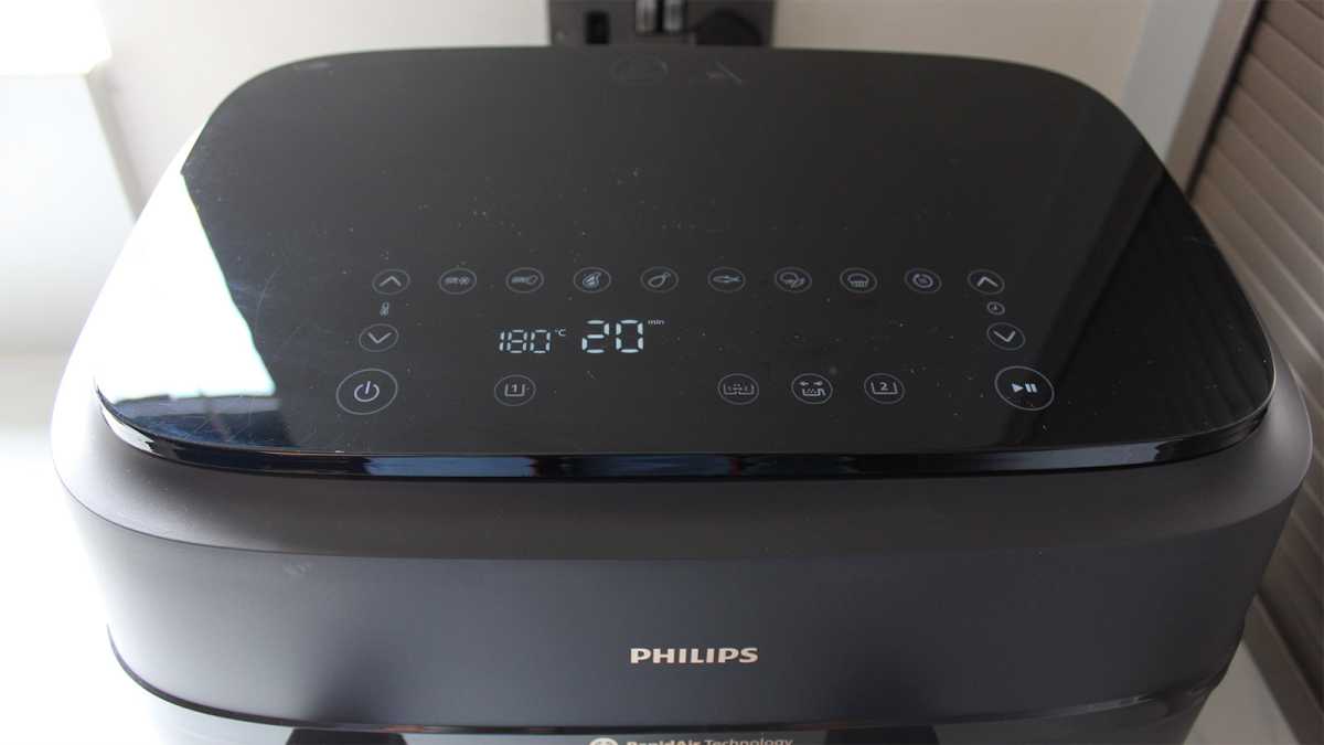 The digital control panel on top of the air fryer