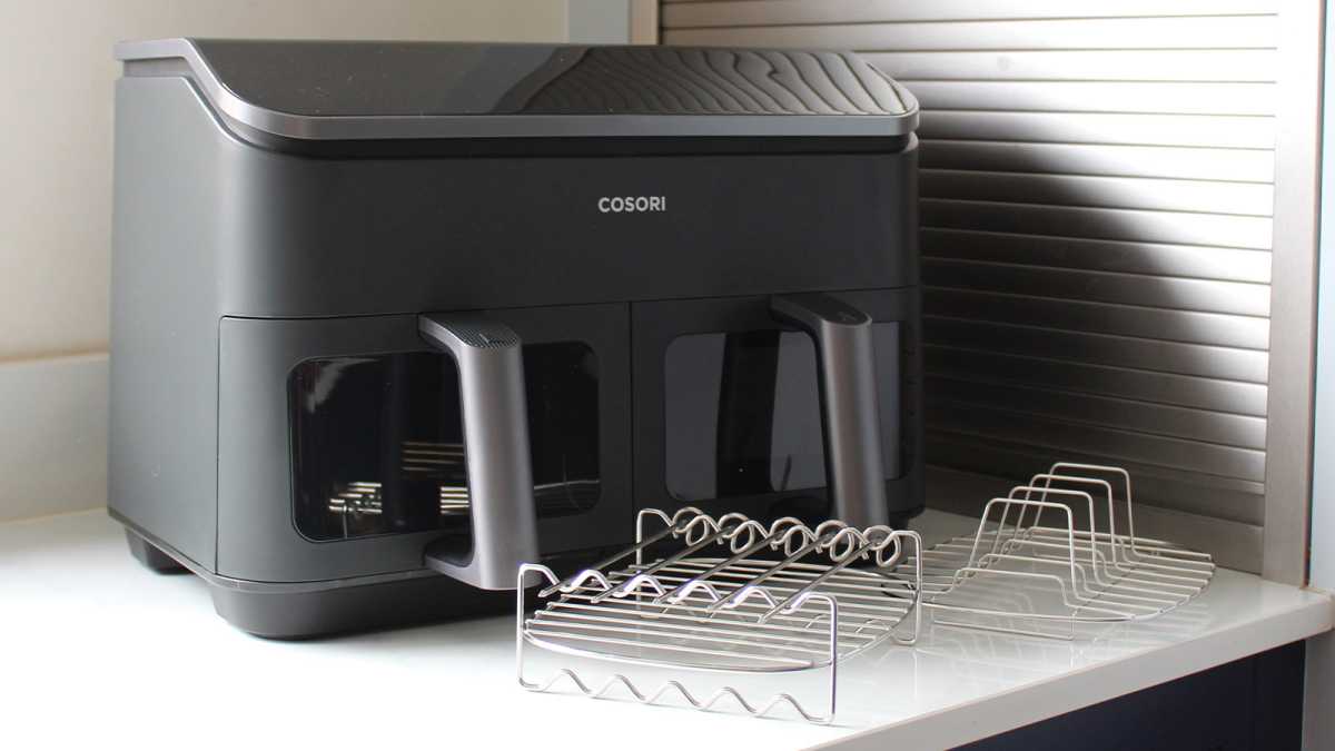 Wire racks and skewers in front of the air fryer