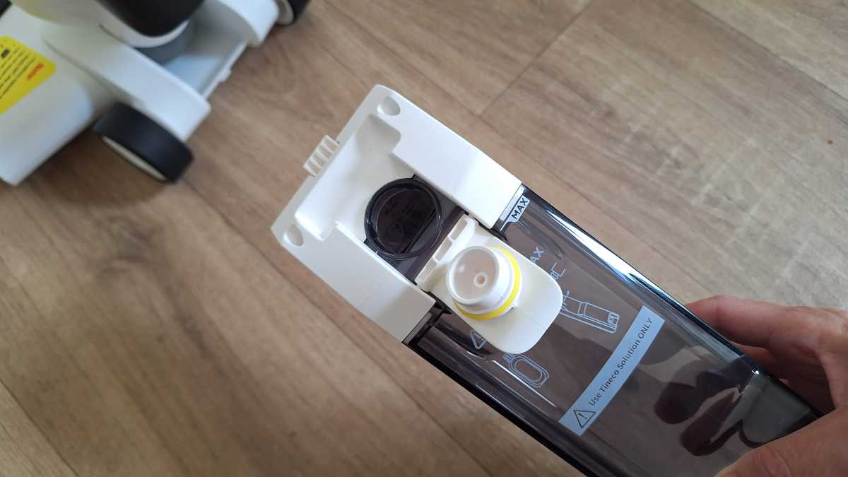 A view of the Tineco iFloor 5 Floor Washer clean water tank with plug uncorked.
