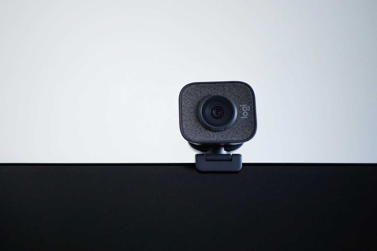 Logi webcam mounted on a monitor staring at you