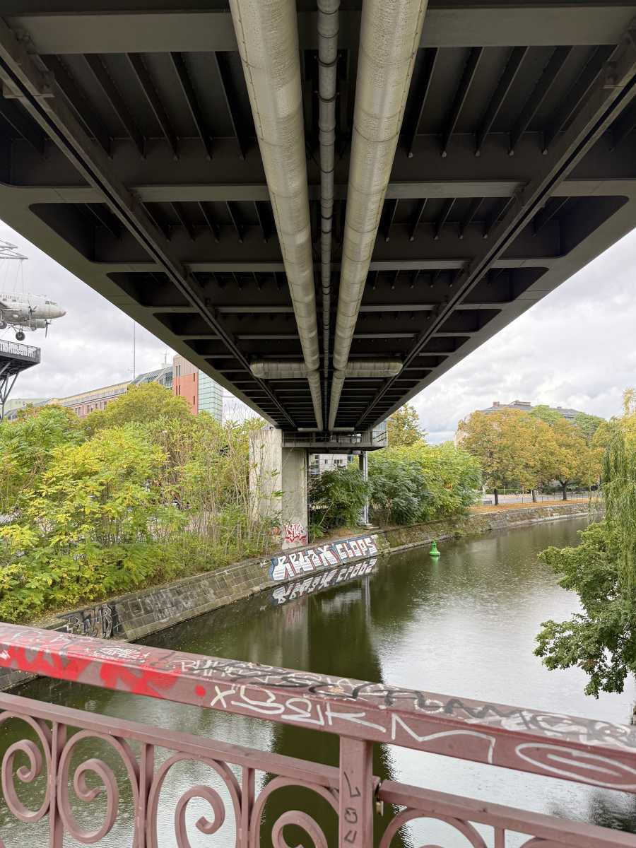 iPhone 16 Pro Max Sample Zoom Photo of a river from under a bridge