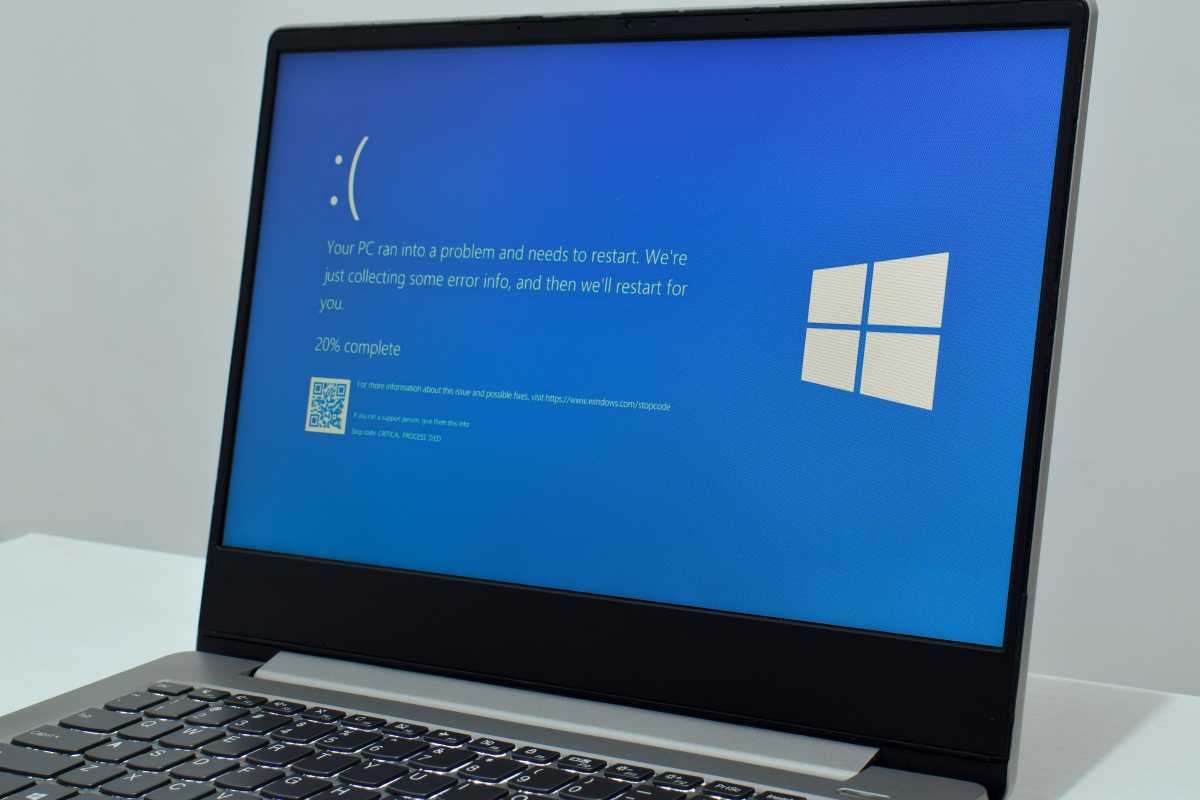 Windows 11 laptop with Blue Screen of Death BSOD hero