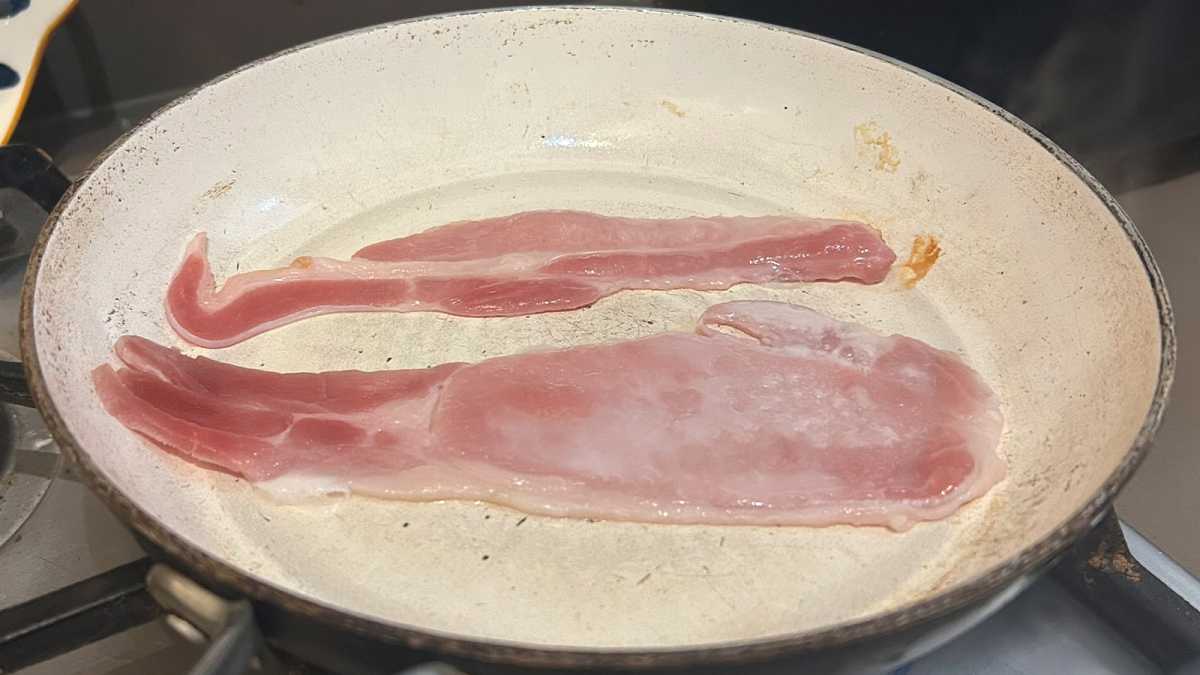 Bacon in a frying pan