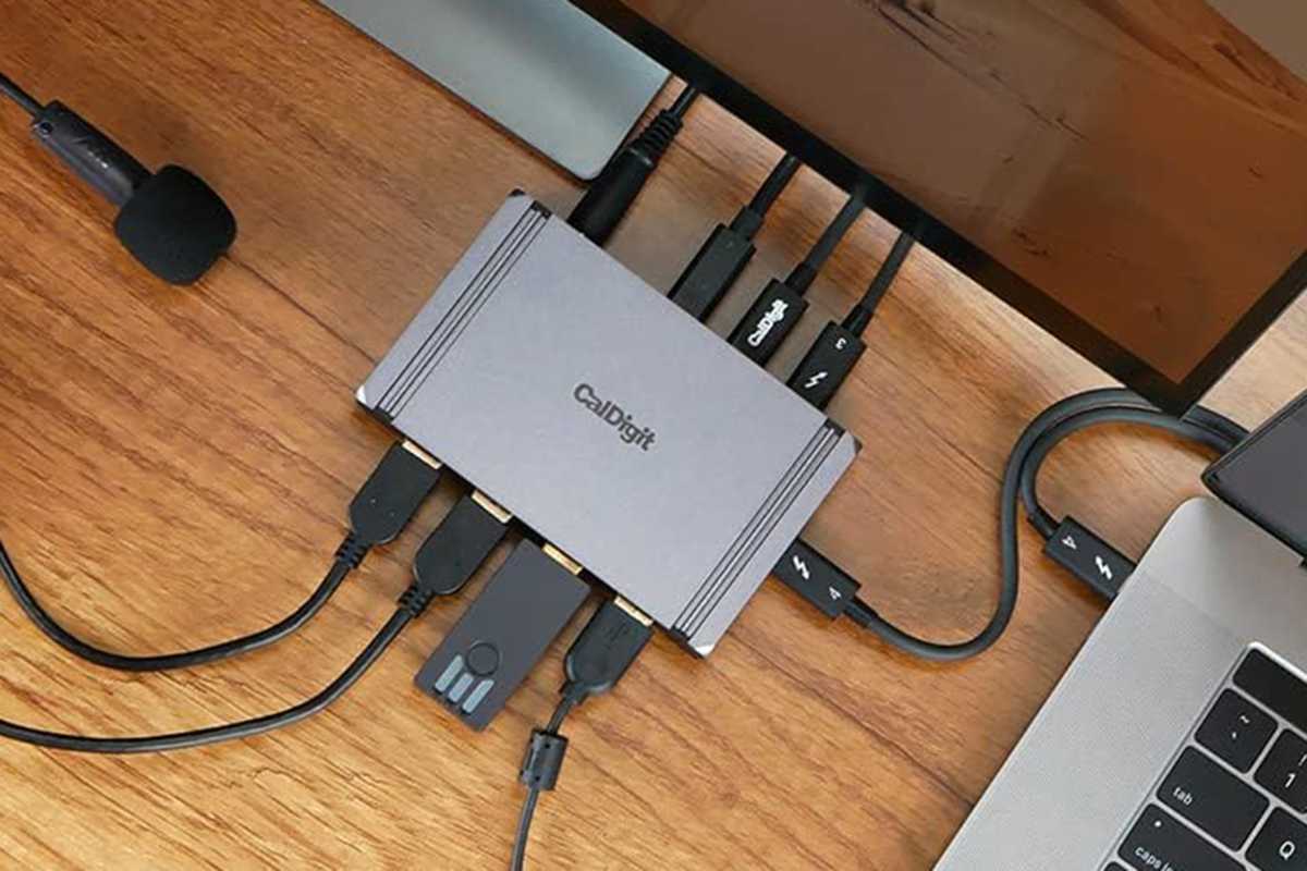 Caldigit Thunderbolt 4 Element hub with cables connected to a Mac or display