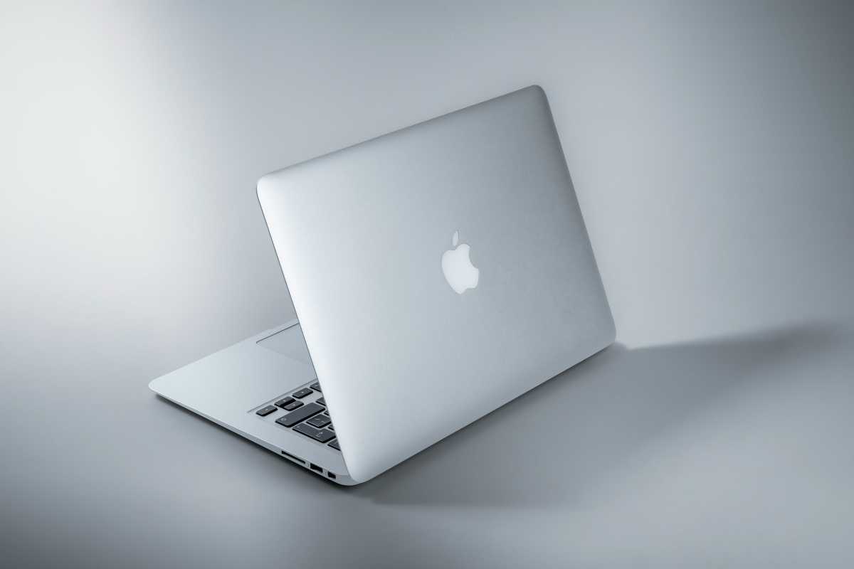 MacBook laptop on bland gray background product shot