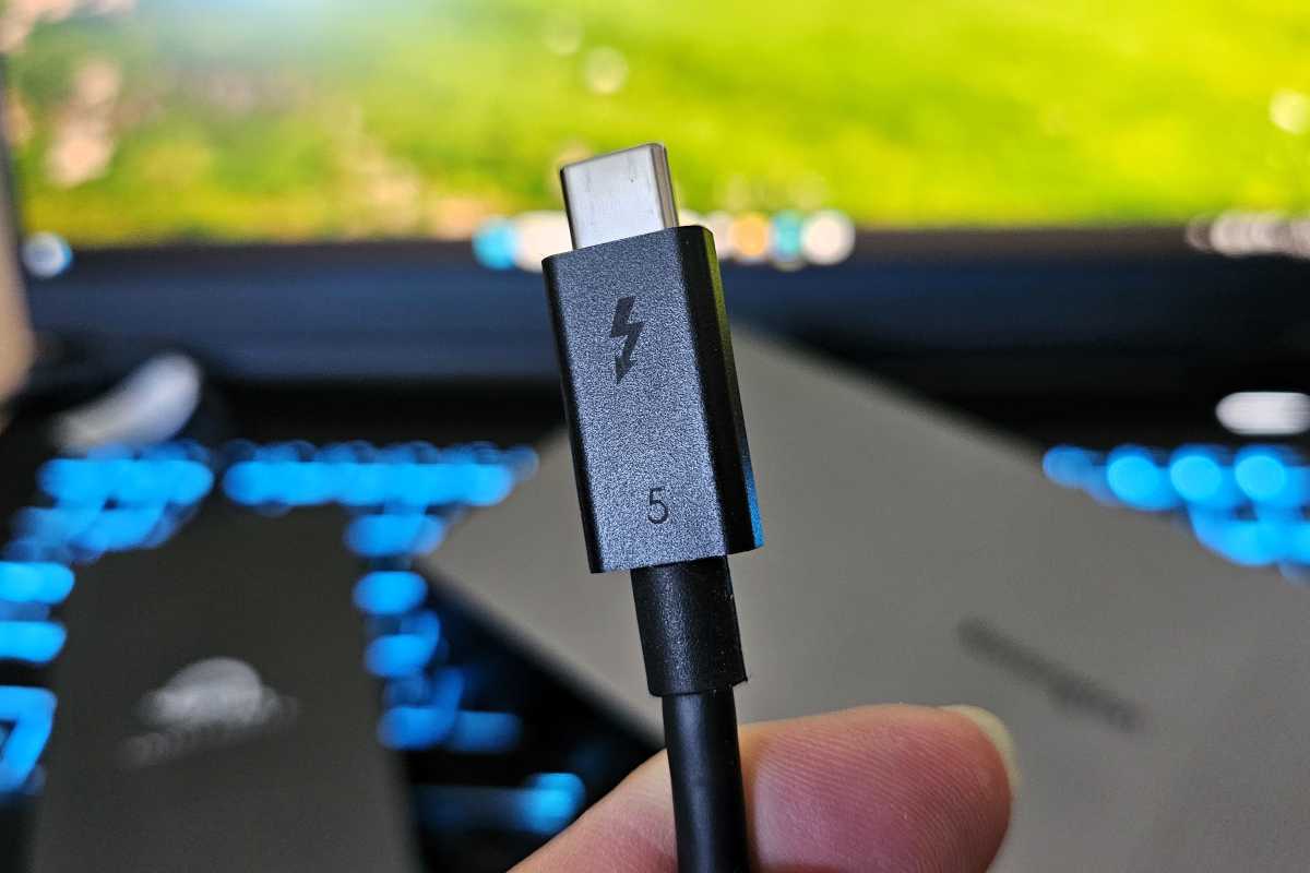 Thunderbolt 5 USB-C cable close up held in hand