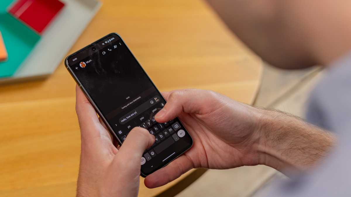 A man using the Google Pixel 8 smartphone