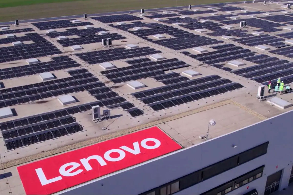 Lenovo branding on top of massive building with solar panels on roof