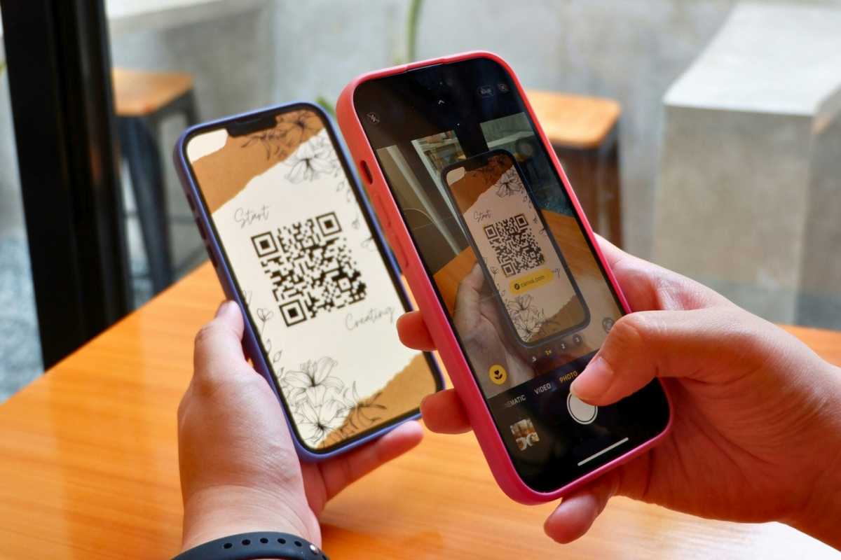 A phone scanning a QR code on another phone