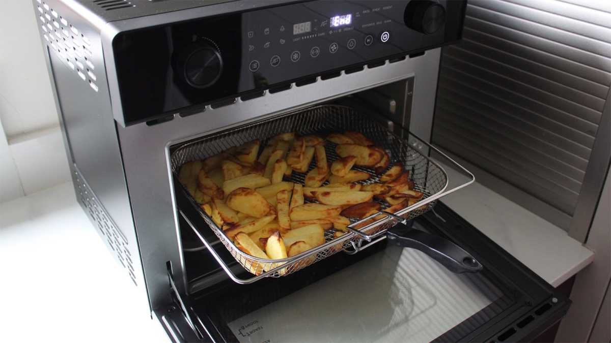 Chips in an air fryer basket at the VonHaus