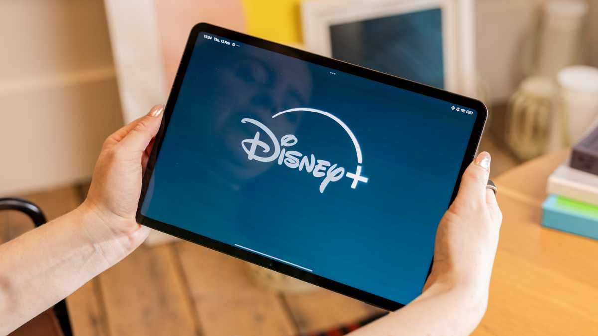 Disney+ logo on a tablet - Streaming lifestyle shot