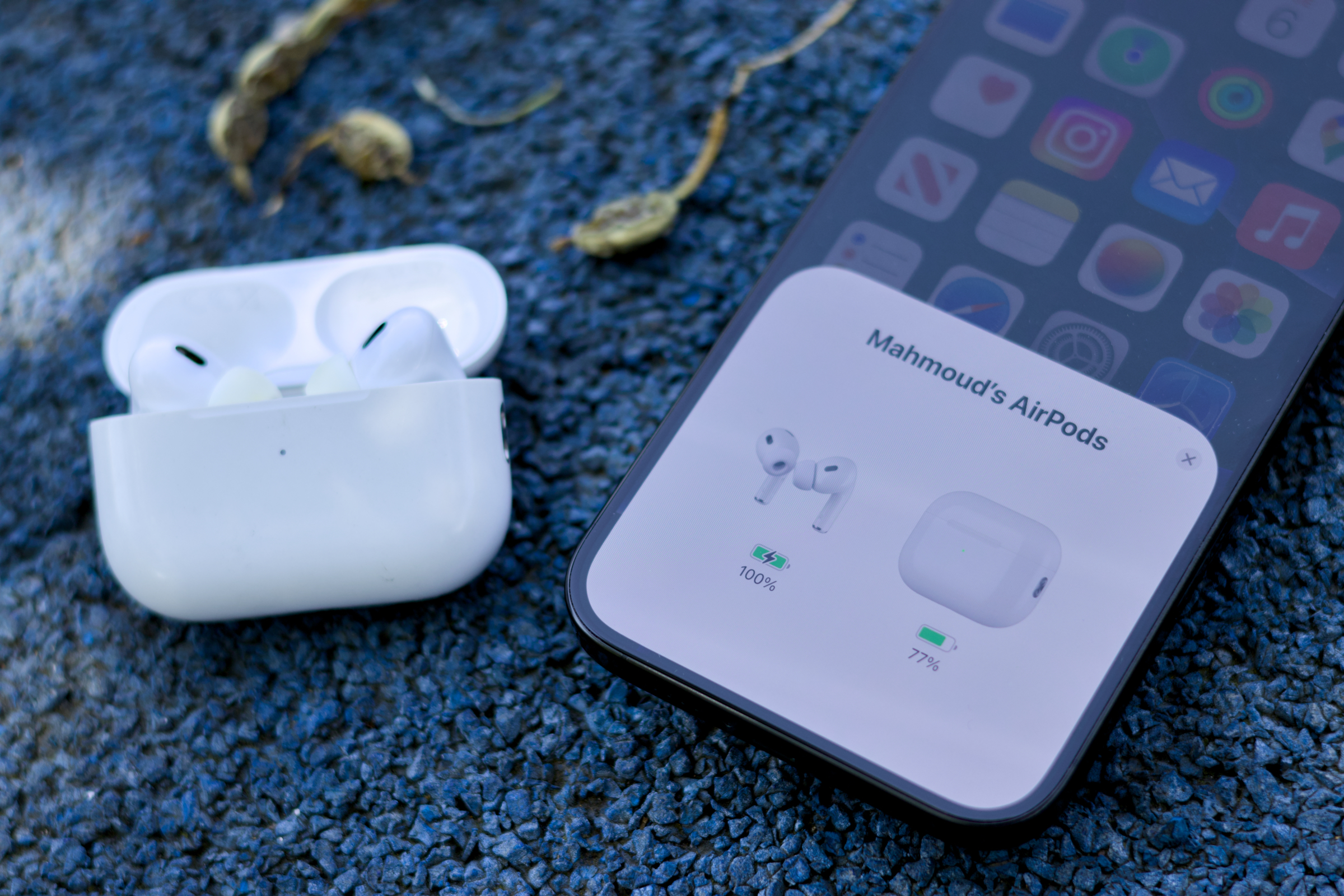 AirPods Pro 2 next to iPhone 16 Pro Max