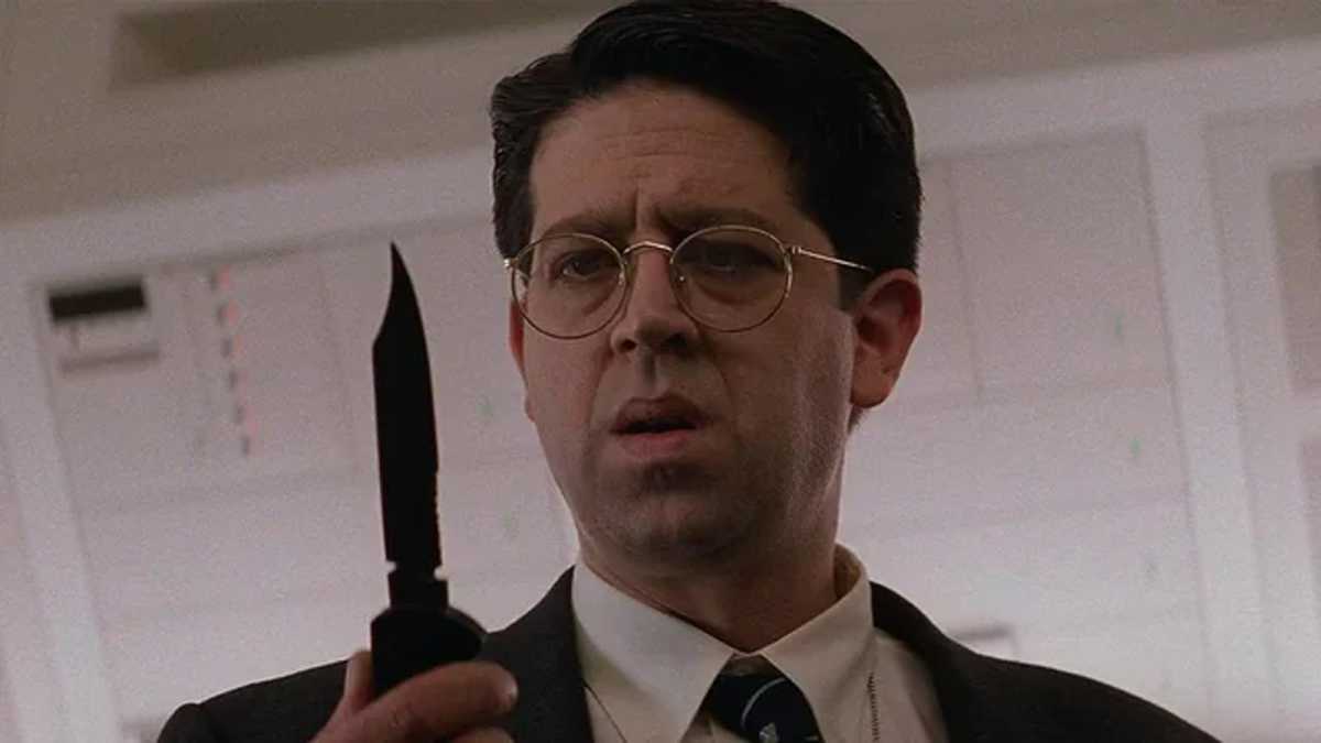 William Donloe holding a knife in Mission Impossible