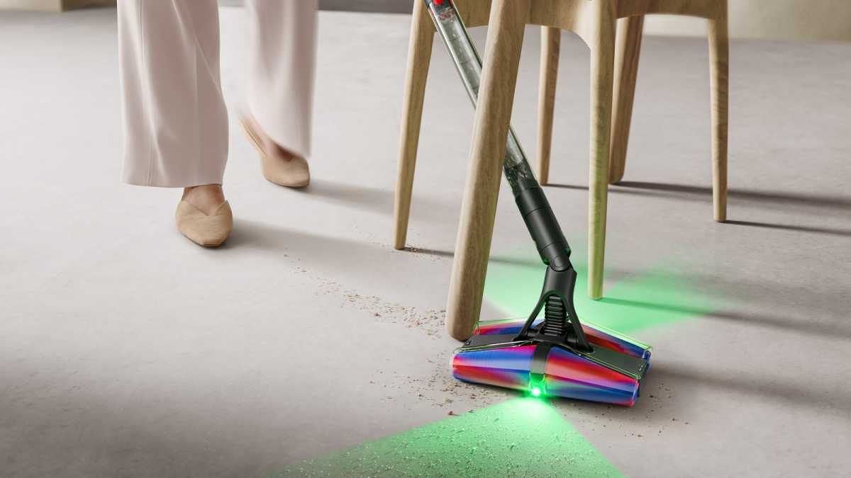 PencilVac manoeuvring around chair legs
