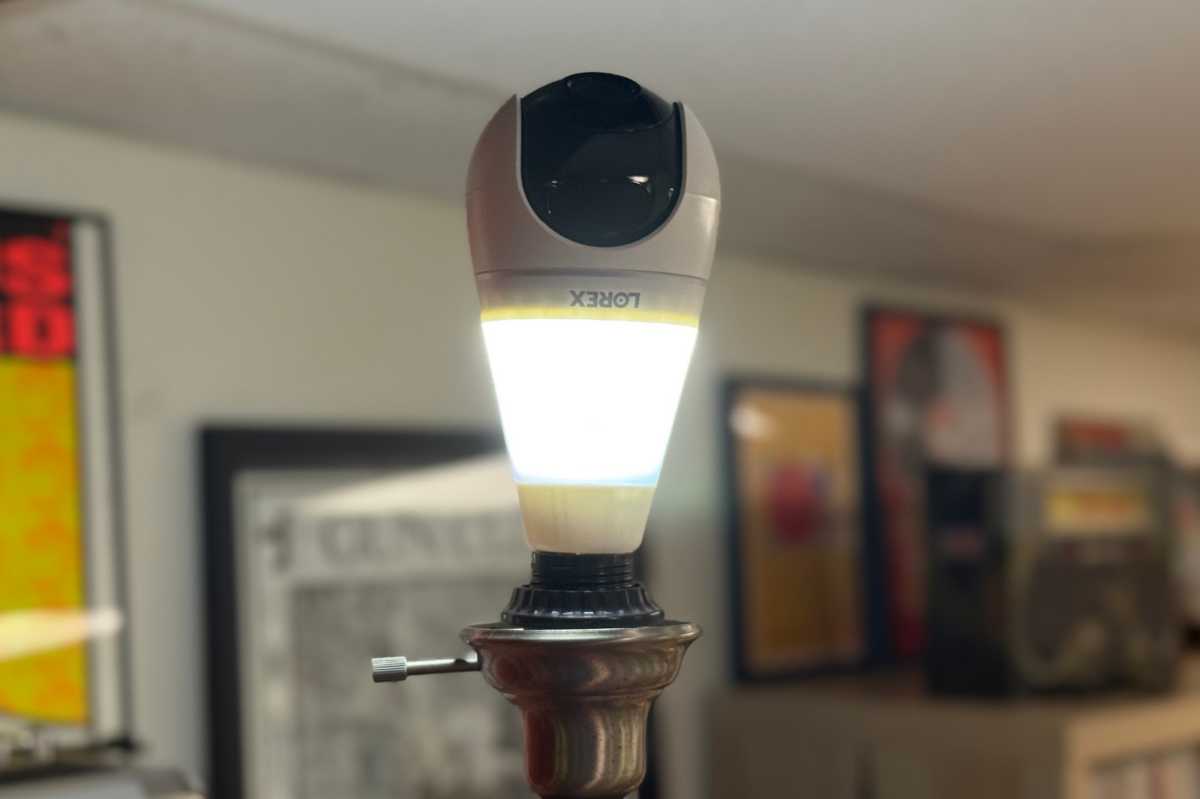 Lorex 2k Wi Fi Lightbulbcam in lamp lit