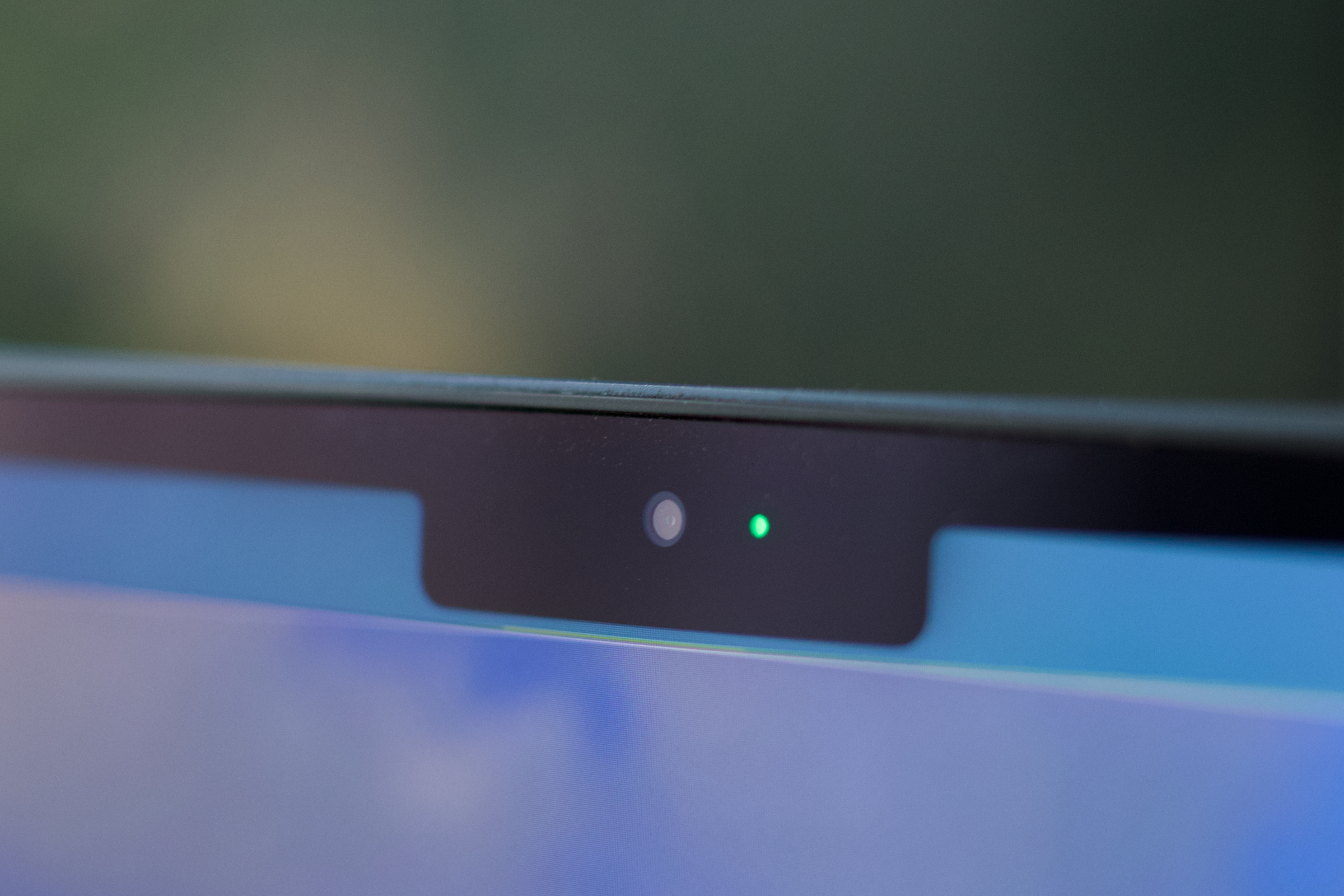 MacBook showing FaceTime camera in use with green light