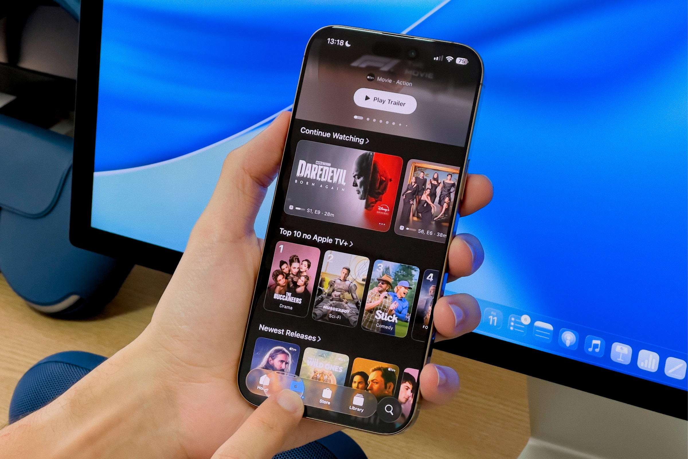iOS 26 beta showing liquid glass menu bar