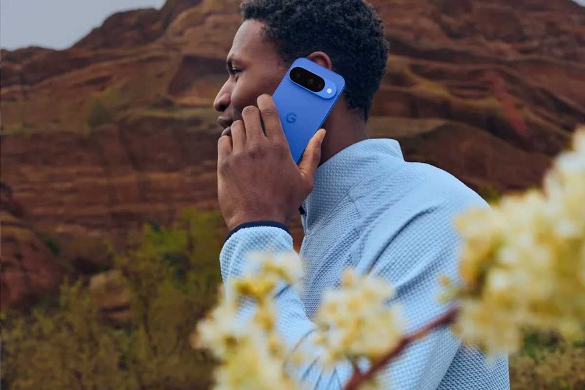 Person outdoors using teh Google Pixel 10