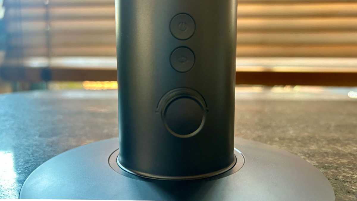 Close look at the button and dial controls on the stand