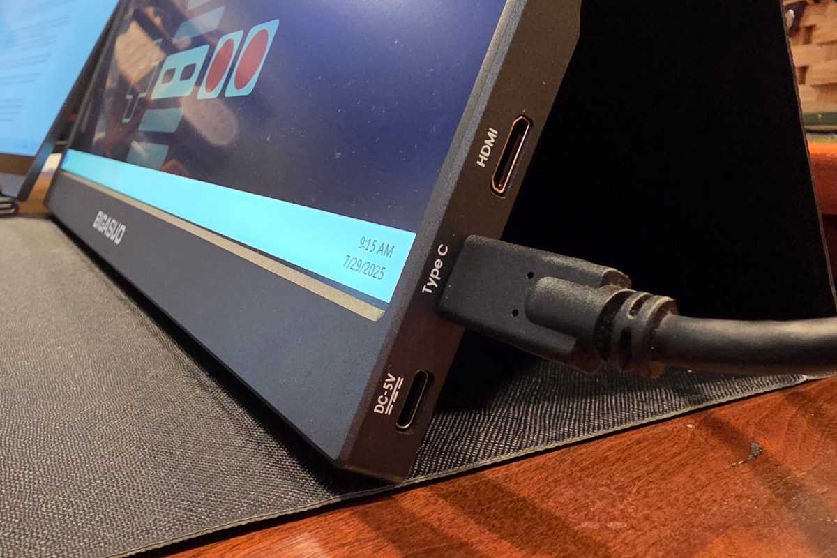 The connection ports on a portable monitor, including USB-C power, USB-C data, and mini HDMI
