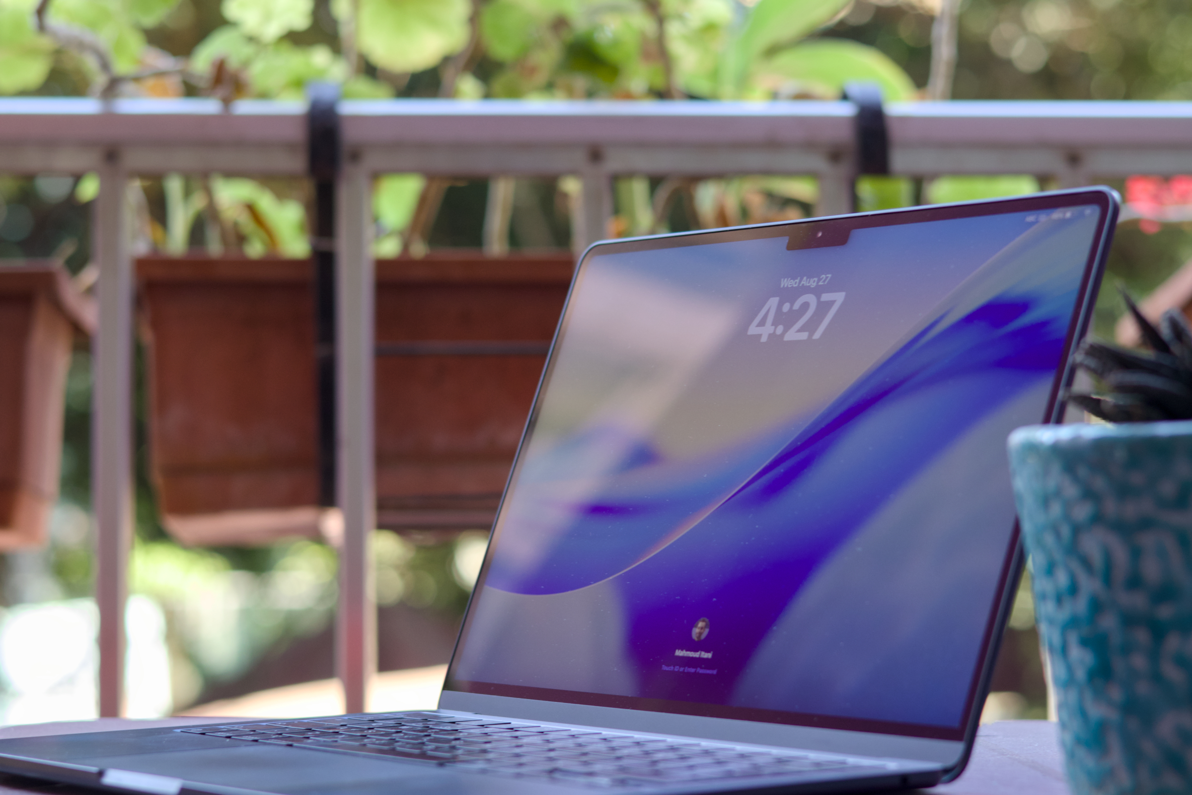 M2 MacBook Air open on a porch