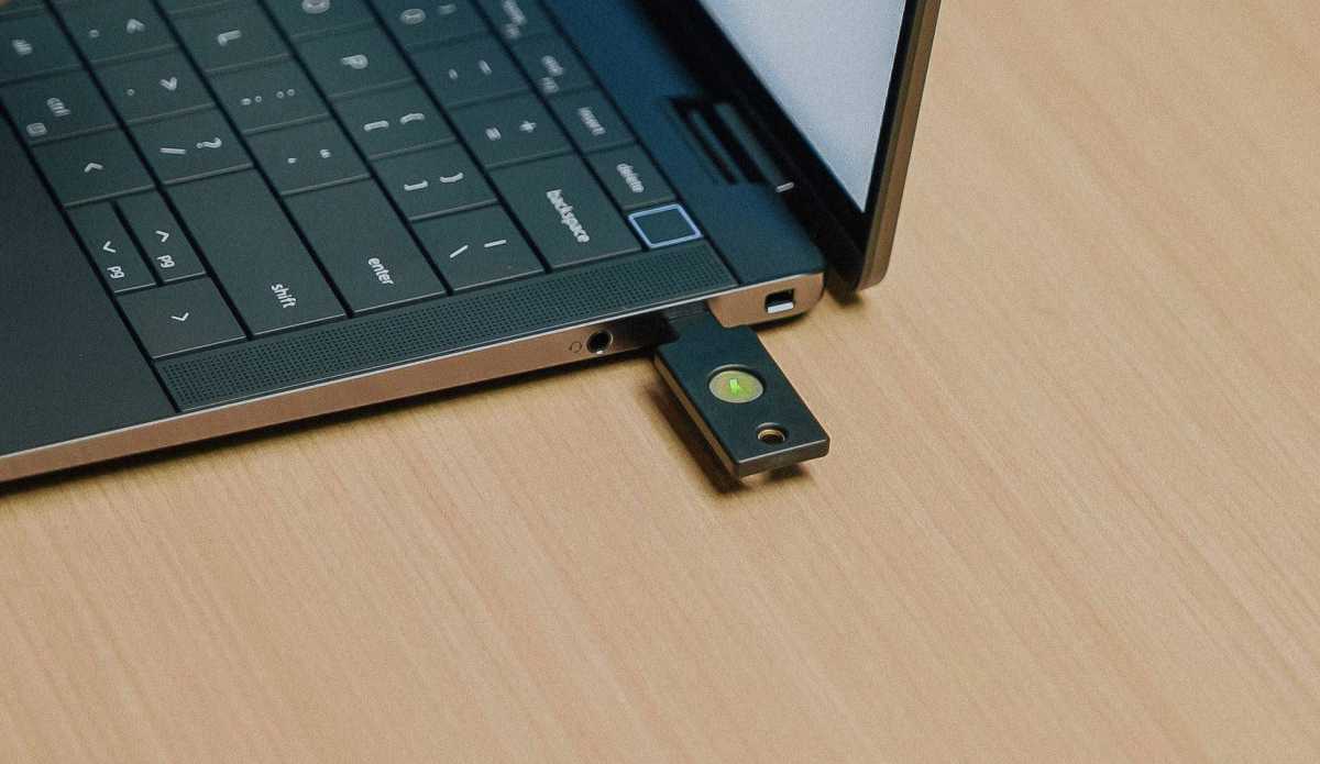 USB-C version of a YubiKey plugged into a Windows laptop