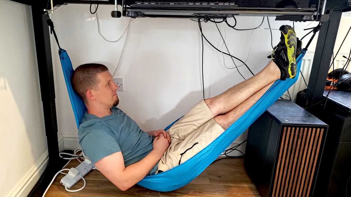 Ridiculous standing desk accessory under desk hammock