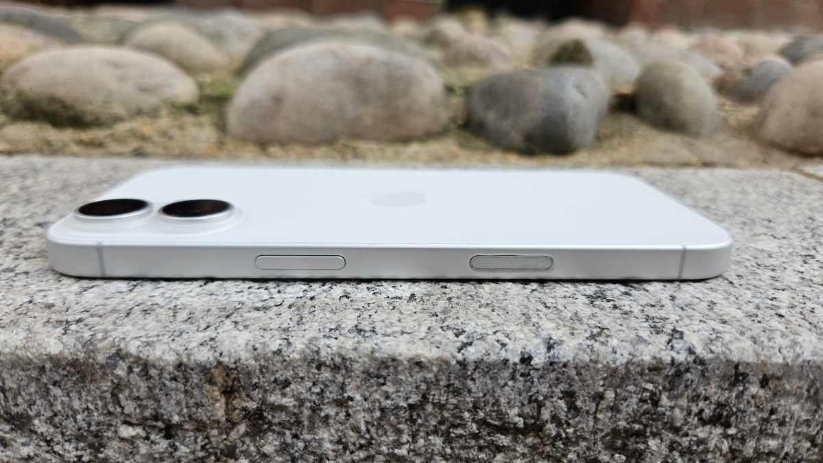 Side view of the iPhone 17 lying on the pavement