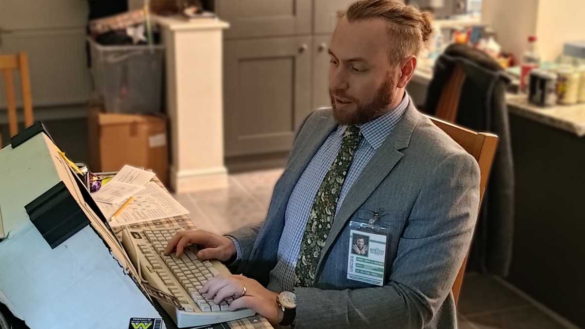 Corporate Weyland Yutani player looking at MUTHUR terminal