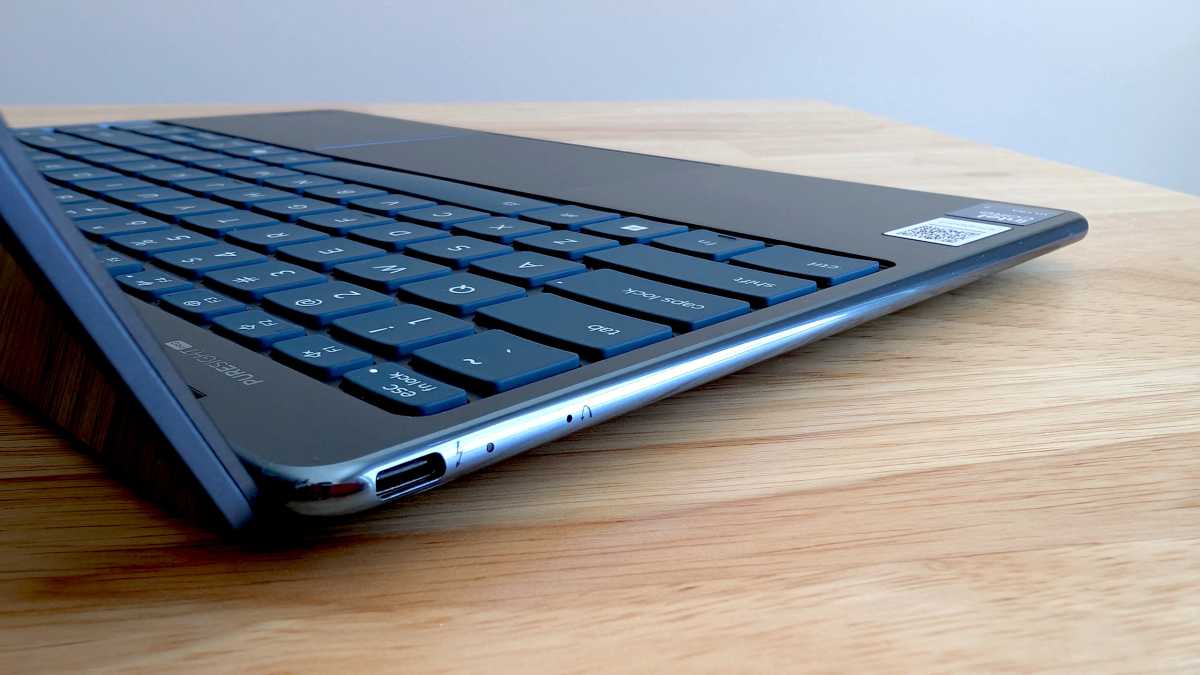 Lenovo Yoga Slim 9i 14 laptop left side on desk